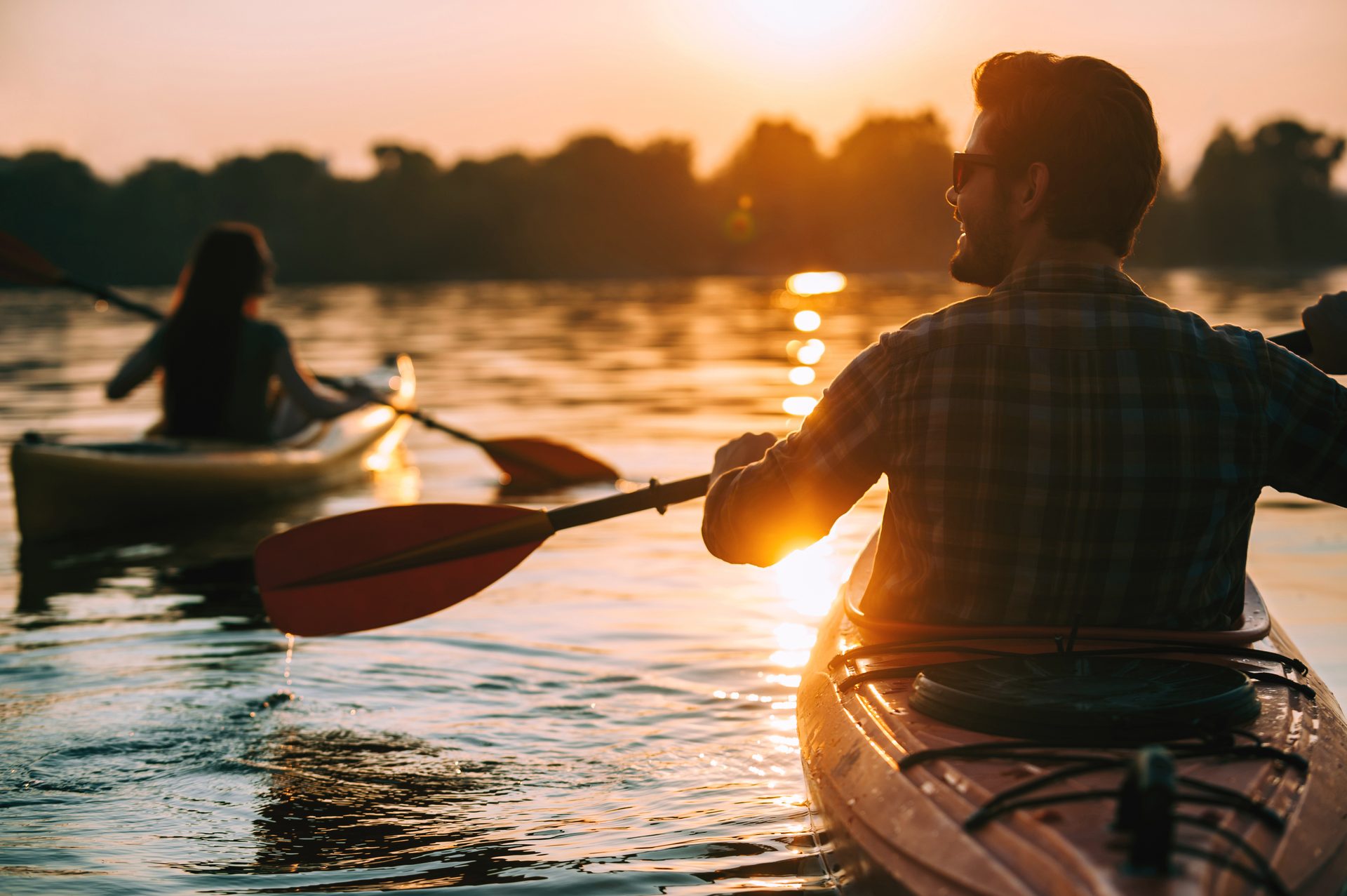 Kayaking on a Finger Lake at golden hour